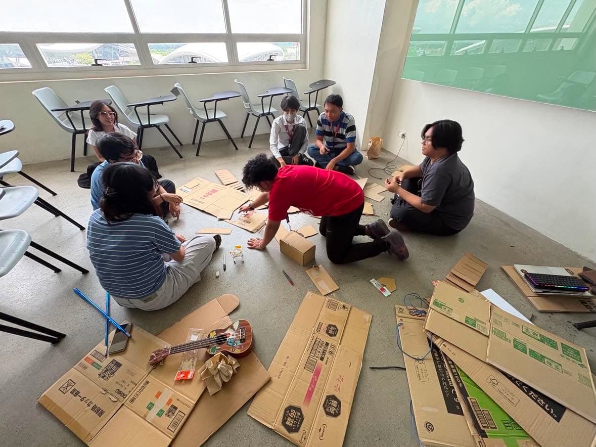 NEXT members collaborating on a hands-on project